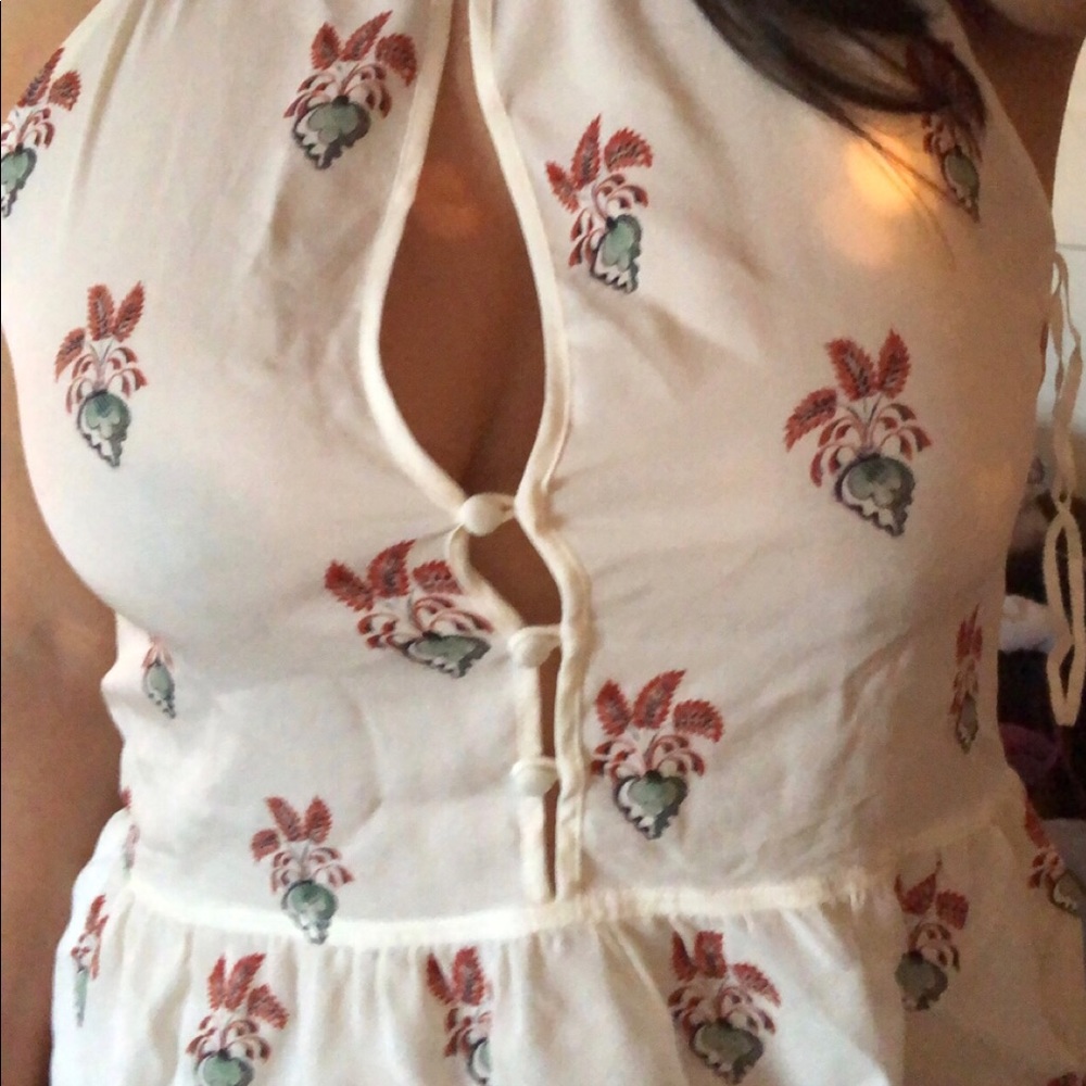 Unique floral top. NWT